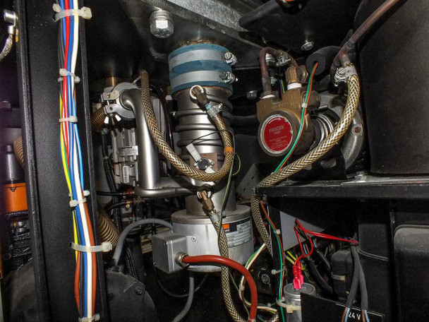 Sorvall RC-80 deep interior view showing motor/rotor drive assembly, braided vacuum lines, solenoid valves, and interconnecting plumbing components