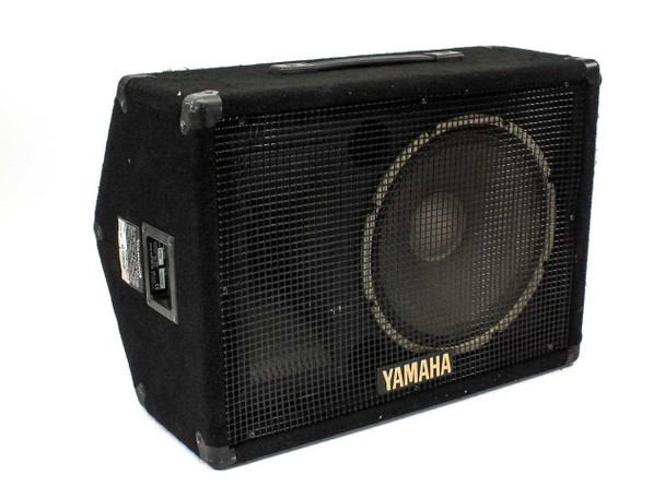 Yamaha S12Me SE Series 12-inch floor monitor – single unit front three-quarter view showing grille, woofer, and carpet covering
