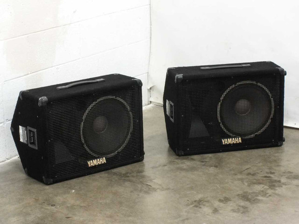 Yamaha S12Me SE Series 12-inch floor monitor pair – front view showing both speakers with metal grilles and Yamaha logo
