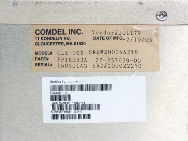 Comdel CLX-10K label close-up showing model CLX-10K, part number FP1605RA, secondary part 27-257659-00, serial 16050143, date of manufacture 2/10/05, and Novellus part number label with Revision A