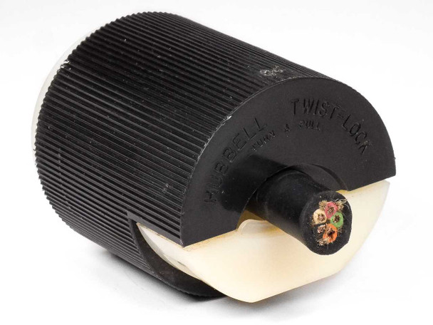 Hubbell 231A twist-lock male plug – rear view showing Hubbell Twist-Lock Turn & Pull molding and pre-wired multi-conductor cable exiting body