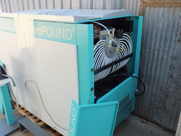 TTP Labtech comPOUND CM601 freezer cabinet opened showing large insulated tubing coil and internal refrigeration components