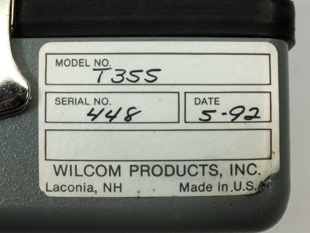 Wilcom T355 optical transmitter bottom label showing model T355, serial 448, date 5-92, Wilcom Products Inc Laconia NH Made in USA