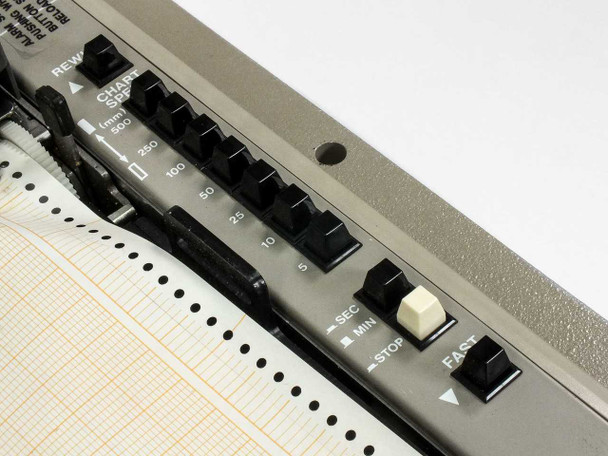 Graphtec WR3320 right-side panel — chart speed selector switches showing 5, 10, 25, 50, 100, 250, 500 mm/min positions, STOP, FAST, REWIND, and SEC/MIN controls