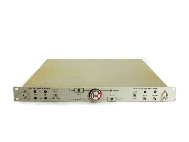 Specialty Microwave 4000A-70 front panel full view showing 1:1 TX Protection Switch 4000 label, ON-LINE and OFF-LINE RF port indicators, Auto/Manual/Test switches
