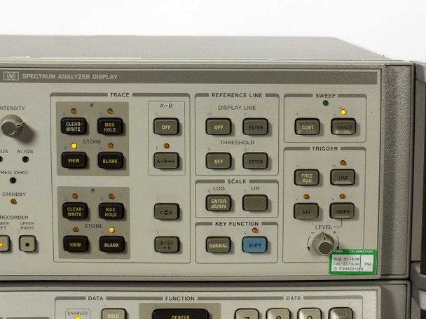 HP 8566B display unit front panel close-up — TRACE, REFERENCE LINE, SWEEP, TRIGGER, SCALE, and KEY FUNCTION control sections