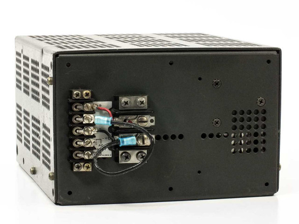 Lambda LXS-D-24 Regulated Power Supply – rear view showing screw terminal block output connections with wiring