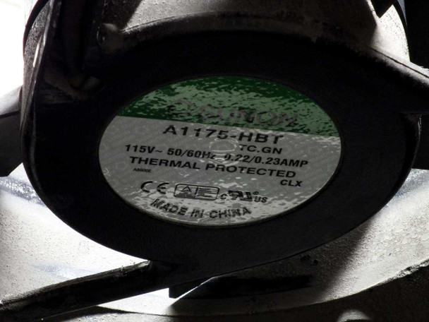 Close-up of the installed fan label: model A1175-HBT, 115V 50/60Hz, 0.72/0.23A, Thermal Protected, CE and UL certified, Made in China