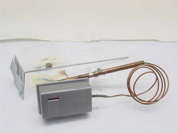 Honeywell LP900A 1066 Grad-U-Stat thermostat with copper capillary bulb sensor coiled, shown next to open packaging and paperwork