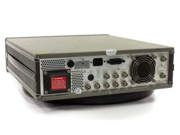 HP 3325A rear panel showing BNC outputs, GPIB connector, IEC power inlet, and cooling fan