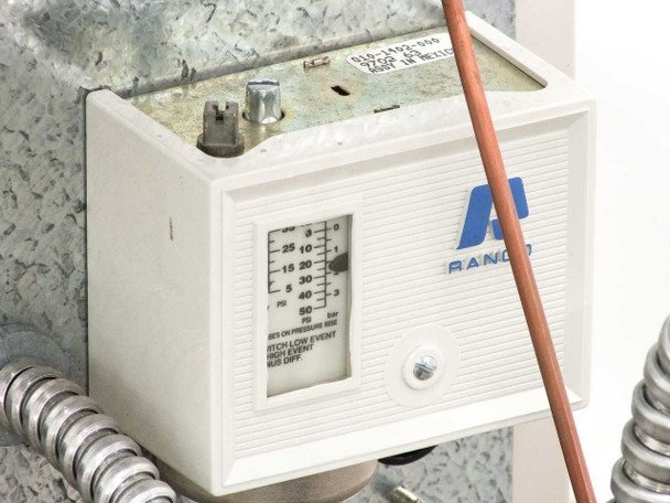 Ranco pressure/temperature controller mounted on AEC TDWF7M09S4 showing scale 0–30 PSI range and capillary tube connection