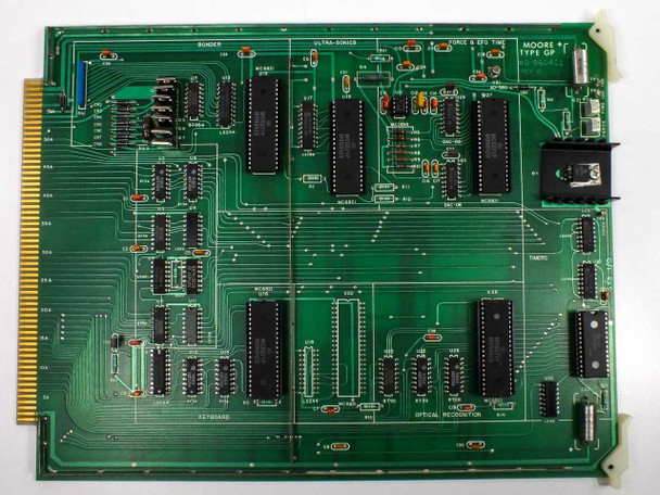 Hughes 2470-II Wire Bonder control card — green PCB labeled 'MOORE TYPE GP' with sections marked BONDER, ULTRA-SONICS, IMAGE & EFO FIRE, KEYBOARD, OPTICAL RECOGNITION, gold edge connector