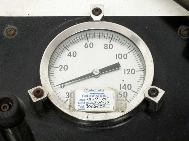 Close-up of right pressure gauge (0-150 PSIG) with TT Electronics calibration label dated 12-9-15, next due 12-11-17