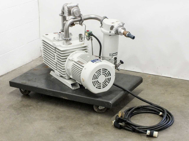 Leybold D60AC TRIVAC rotary vane vacuum pump with GE motor on wheeled dolly, front-left view, power cable coiled in foreground and mist separator canister visible at top right