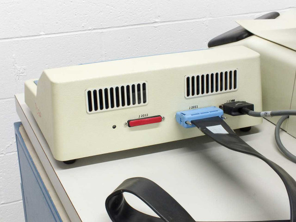 Hughes 2500 Die Bonder external controller rear panel showing J2012 and J2011 connector ports with cables attached