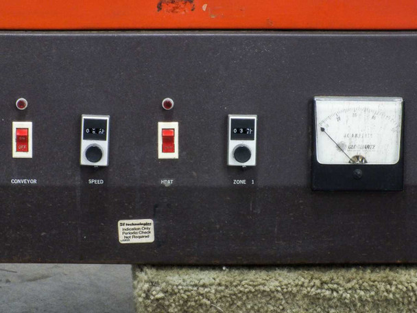 Glo-Quartz TR91-12A front control panel showing Conveyor switch, Speed dial, Heat switch, Zone 1 dial, and AC ammeter