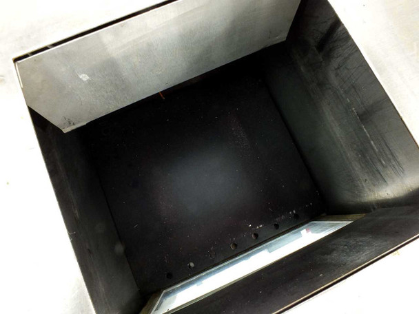 Thermotron LBD-883 chamber interior view showing black-coated stainless steel tank interior with top-loading access