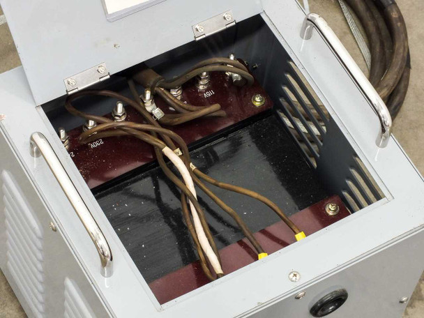 Ikegami 5306220 transformer interior – top lid open showing transformer core with multi-tap terminal blocks and wiring harness