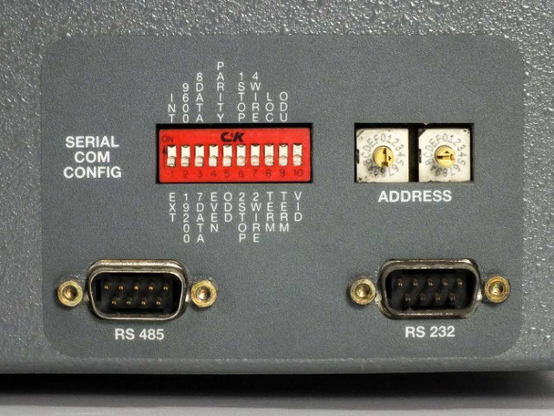 XTC-140D rear panel serial communications config section showing C/K DIP switch bank, ADDRESS potentiometers, RS-485 and RS-232 DB9 connectors