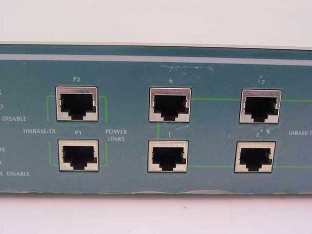Network Peripherals NP-SET-210 — front panel close-up showing left-side RJ-45 ports P1, P2, ports 1–3, and 6–7 with 100BASE-TX labels