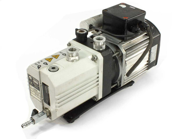 Leybold Trivac D2.5E 140000 dual stage rotary vane vacuum pump — three-quarter front view showing pump body, KF inlet/outlet fittings, caution labels, and Hanning motor