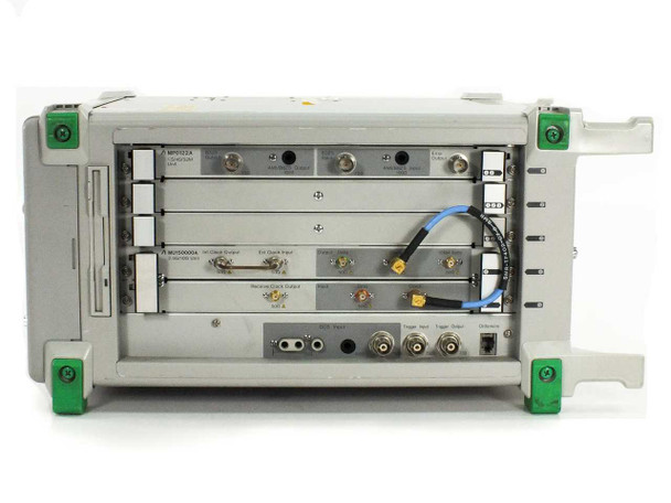 Anritsu MP1570A top panel open showing installed plug-in modules: MP0122A and MU150000A with SMA/BNC connectors and interconnect cabling visible