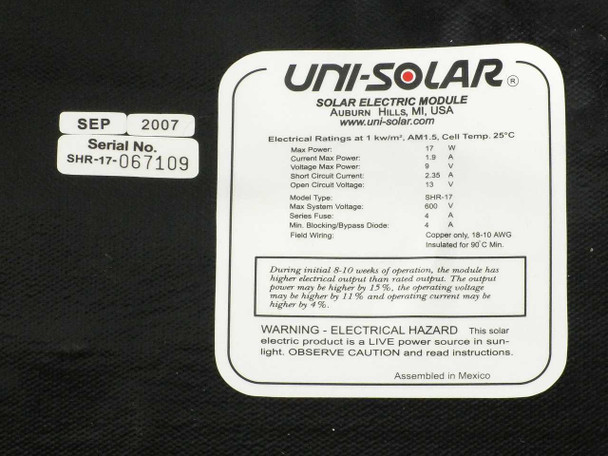 Close-up of Uni-Solar SHR-17 product label showing electrical ratings, model SHR-17, serial number SHR-17-067109, manufacture date September 2007, and assembly in Mexico notation