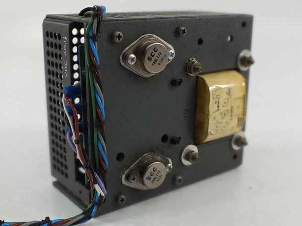 Lambda LND-Y-152 power supply – side/rear view showing SCC transistors, transformer, and output wiring harness