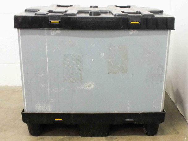 JSI JSI-0047 collapsible container fully assembled, side panel view showing grey corrugated walls and yellow latch hardware at top and bottom corners