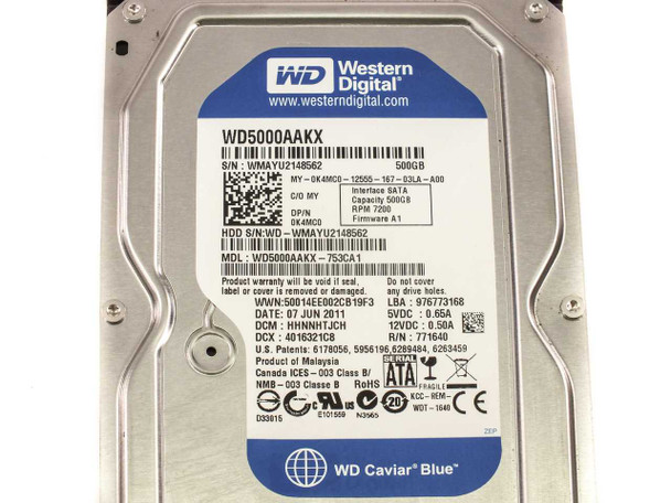 Western Digital WD5000AAKX Caviar Blue 500GB hard drive — rear label view showing interface SATA, 7200 RPM, firmware A1, and date of manufacture July 2011