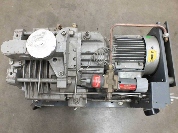 Edwards DP40 dry pump — left side view showing pump stages, inline filter, motor with 208V label, and steel base frame