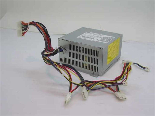 HP 0950-2700 Astec SA147-3505 145W ATX power supply — three-quarter front view showing vented metal housing and full cable harness with Molex and Berg connectors