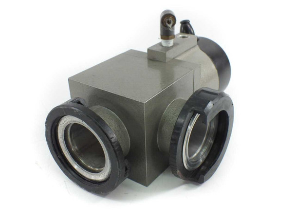 Edwards PV40 valve body showing both NW40 centering-ring ports with clamping collars, actuator section removed to reveal port configuration