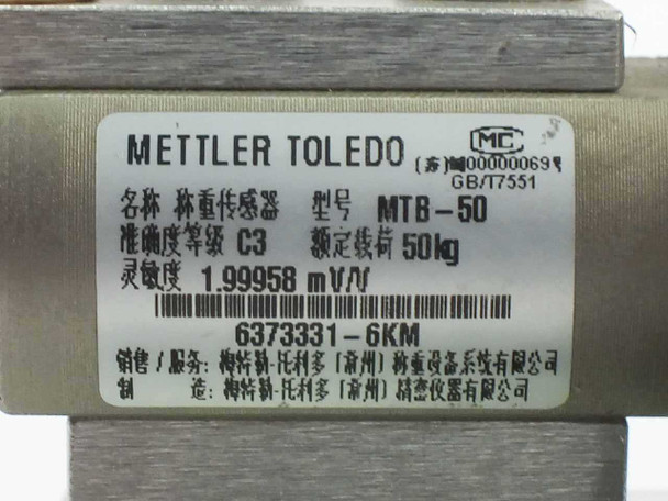 Mettler Toledo MTB-50 load cell specification label showing model MTB-50, 50kg capacity, accuracy class C3, sensitivity 1.99958 mV/V, and part number 6373331-6KM