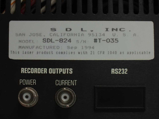 SDL-824 rating label showing Model SDL-824, S/N T-035, manufactured September 1994, SDL Inc., with Recorder Outputs BNC connectors and RS-232 port