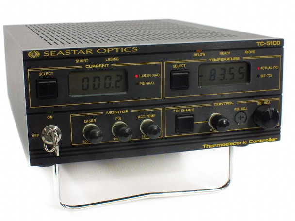 ILX Lightwave LightStar TC-5100 Thermoelectric Controller front panel showing dual LED displays for current and temperature, monitor section, control knobs, ON/OFF key switch, and Seastar Optics branding