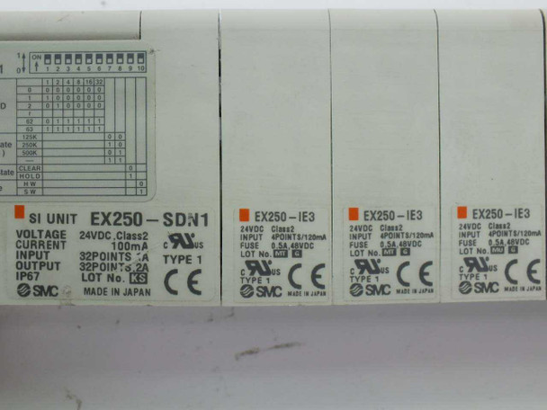 SMC EX250-SDN1 SI unit and EX250-IE3 input unit labels showing 24VDC Class 2 ratings, IP67, and Made in Japan markings