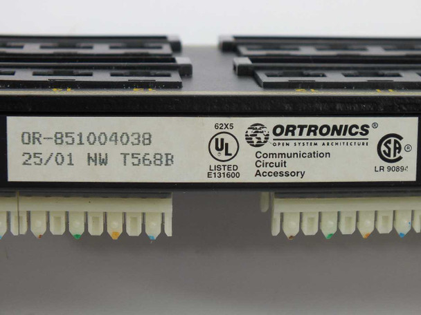 Ortronics OR-851004038 label close-up showing part number, T568B wiring standard, UL listing E131600, CSA mark, and manufacture date 25/01