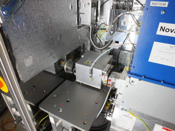 Lambda Physik NovaLine K2020B internal beam path area – NovaTube laser tube housing and optical bench visible with mounting hardware