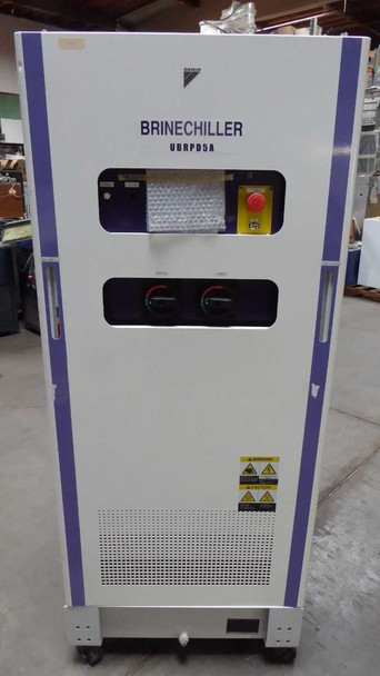 Daikin UBRPD5A-2 Brine Chiller – straight-on front view showing full cabinet with BRINECHILLER and UBRPD5A nameplate, touchscreen display, dual rotary knobs panel, E-stop, and caution labels