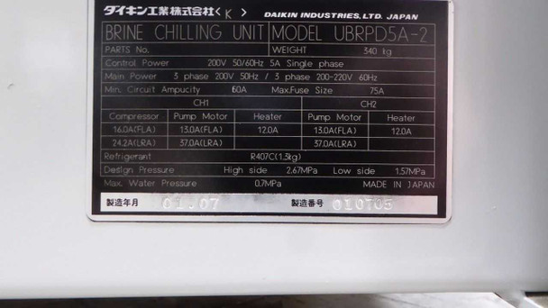 Daikin UBRPD5A-2 Brine Chiller – close-up of rating plate showing model UBRPD5A-2, 200-220V 3-phase 50/60Hz main power, R407C refrigerant 1.9kg, design pressures, CH1 and CH2 current ratings, Made in Japan