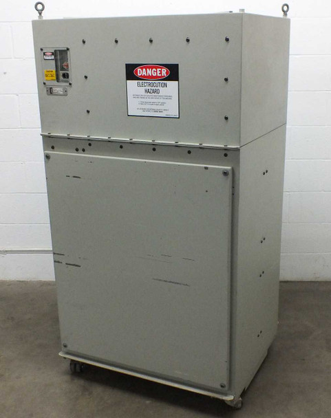 Rimage 5661C degausser rear view — gray cabinet rear showing DANGER ELECTROCUTION HAZARD warning label, small circuit breaker access panel upper left, mounted on casters