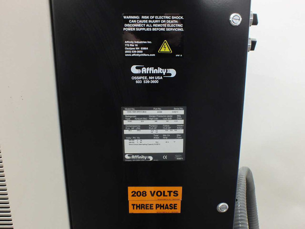 Affinity CWA-100K-MP21CB chiller – rear panel showing rating plate label and 208 Volts Three Phase warning sticker