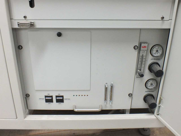 Nicolet ECO-8S lower cabinet interior close-up — OPTICS and PURGE ON/OFF switches, LED status indicators, Dwyer flowmeter and pressure gauge knobs