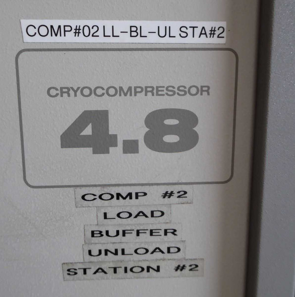 Ebara CryoCompressor 4.8 label panel showing COMP #02 LL-BL-UL STA#2 sticker, CryoCompressor 4.8 nameplate, and station identification labels