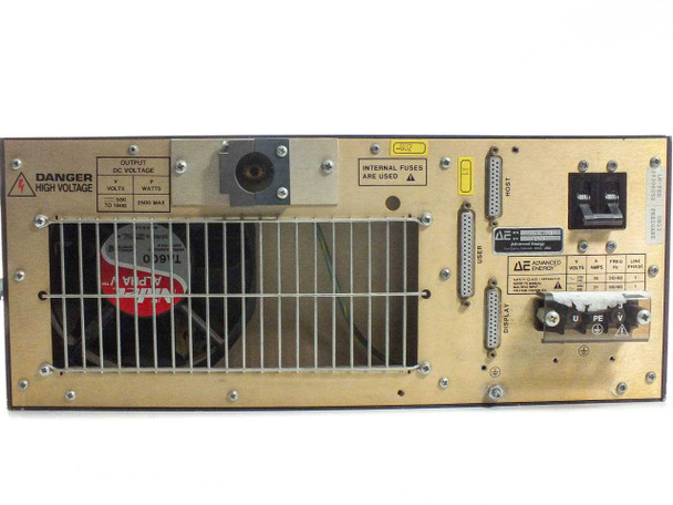Advanced Energy MDX-2.5K rear panel close-up showing DANGER HIGH VOLTAGE label, internal fuses warning, and connector array