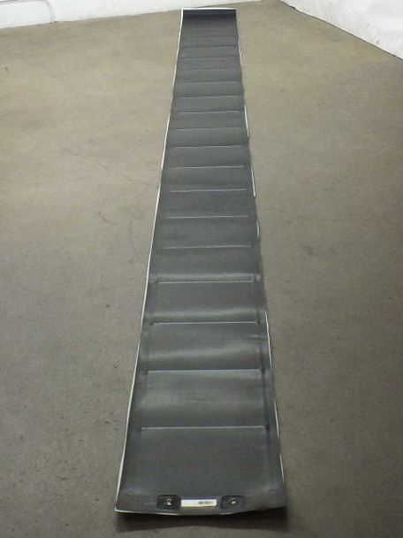 Xunlight XUS19-134 134W flexible solar panel fully unrolled and laid flat on concrete floor showing full length of amorphous cell strips