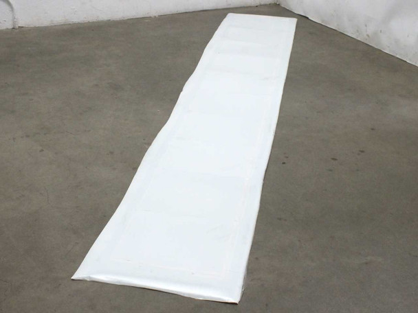 Xunlight XUS10-71 flexible solar panel fully unrolled showing white backing material reverse side