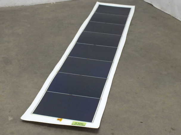 Xunlight XLS8-52 52W flexible solar panel fully unrolled showing full length with six-segment amorphous cell array and white ETFE border