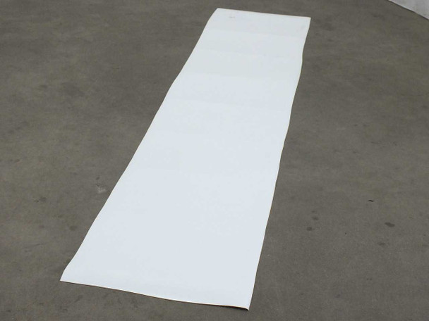 Xunlight XLS8-52 flexible solar panel showing white ETFE back sheet surface fully unrolled on floor
